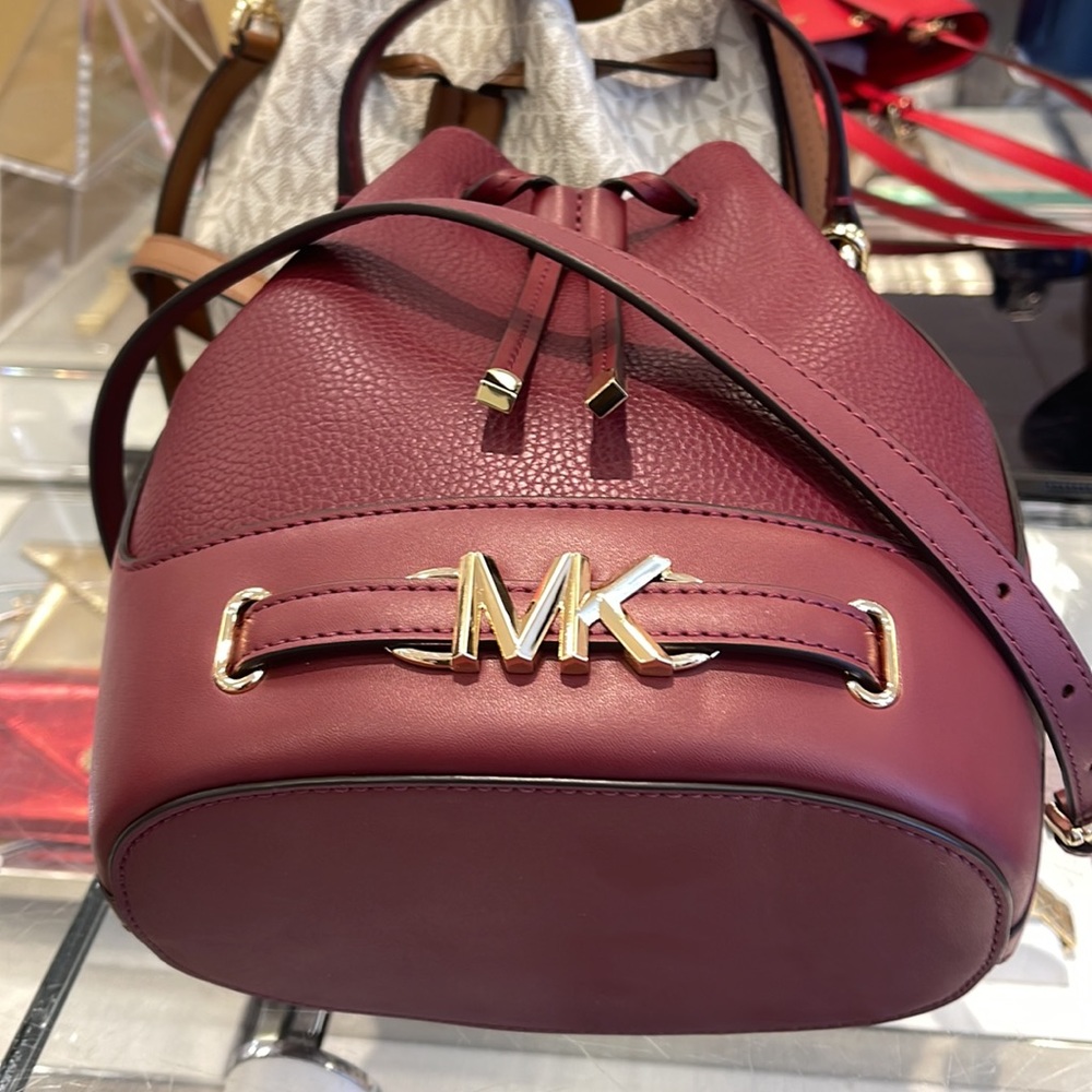 MICHAEL KORS 
Reed Medium Pebbled Leather Bucket Bag
Dark Cherry 
NWT - Picture 8 of 16